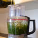 Add olive oil and process. Add the garlic, peppers, spices, and seasonings, and you're done!