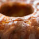 Rum glaze on the top of the apple cake.