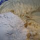 Add the flour and sour cream in three batches, mixing between each addition.