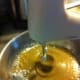 Hand mixing with powdered sugar and vanilla.
