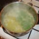 Chopped parsley is added to the soup for a final couple of minutes' cooking