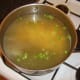 Potatoes and peas are added to the ham stock