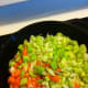 Sweat in the fry pan covered so they don't brown.