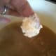 Drop the dumpling dough in small amounts into the broth.