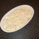 Fish pie filling is added to the pie dish