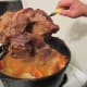 Flipping or Turning Over the Pot Roast after 2 hours. Mix the stock lightly.
