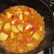 Adding the Potatoes to the Pot Roast Stock.