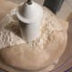 Add brown flour and yeast mixture