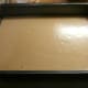 Pour batter into the baking pan.