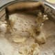 Cut butter into the mixture with a pastry cutter or two knives.