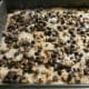Sprinkle the chocolate chip mixture on top of the crumb mixture. Pop into the oven.
