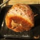 Skin removed, score into diamonds and add cloves
