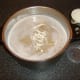 Cream is poured in to the pureed potatoes, chestnuts and duck stock