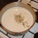 Chopped duck is added to the cream of chestnut soup