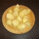 Potatoes are peeled and chopped for chestnut and duck soup