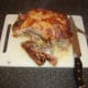 Removing the wings from the roast duck