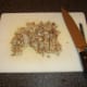 Duck is chopped to the desired size before being added to the soup