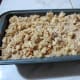 Pour streusel over batter