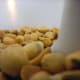 Ingredients needed: peanuts, sugar, salt, oil. Place all your peanuts in the food processor