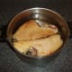 Ham hocks are steeped overnight in cold water.