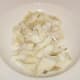 Smoked haddock is roughly flaked