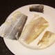 Skin is peeled from smoked haddock