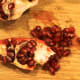 4. Pull out sections and, using thumb, knock out the seeds.