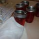 Step two: Use a towel to protect your hand from the hotness of the jars as you screw the cap on.