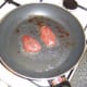 Pigeon breasts are fried in bacon fat