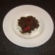Pigeon and venison stew is spooned on to rice bed