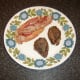 Fried bacon and pigeon breasts
