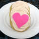 Heart-shaped cutouts from sugar sheets.