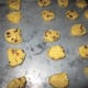 Place sliced dough on cookie sheet and bake.