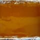 Caramel sauce poured over the baked brownies.