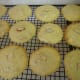 Almond paste cookies cooling on a wire rack.