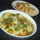Stew is garnished and served with the bread