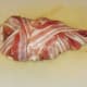 Rabbit saddle wrapped in bacon