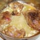 Rabbit pieces are browned and sealed in butter