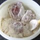 Rabbit pieces turned in seasoned flour