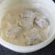 Lamb pieces are tossed in flour