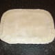 Pastry is fitted and crimped over pie filling