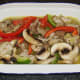 Rabbit and pork pie filling is added to pie dish