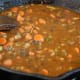 with beef broth, carrots, and Worchestershire added