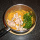 Salmon, coriander/cilantro and chilli flakes are added to sweet potato mash