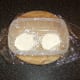 Cream cheese cakes are put in the fridge to chill