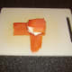 Smoked salmon is wrapped around the cream cheese patties