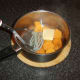 Sweet potatoes are mashed with butter and seasoning