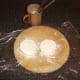 Cream cheese is patted in to cakes