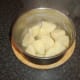 Boiled and drained potatoes are left to steam