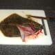 Removing the first fillet from the flounder